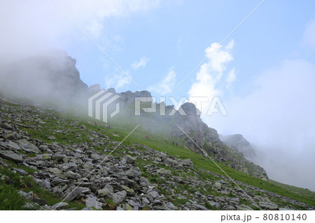 Morning fog lifting in the Pizol region, Switzerland. 80810140
