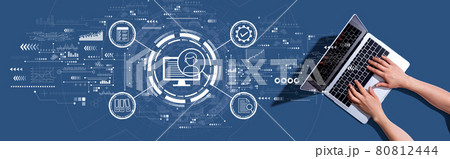 Document management system concept with woman using a laptop 80812444