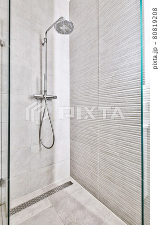 Modern shower stall in a bright bathroom 80819208