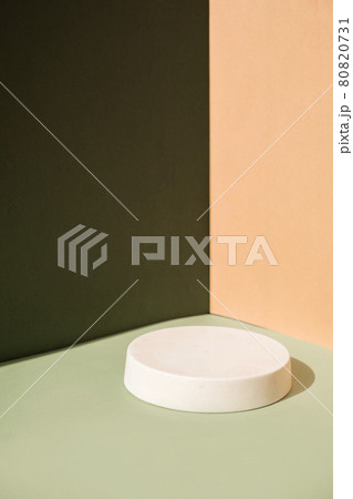 Abstract minimal scene with geometrical forms. Cylinder podiums on green and beige background. Abstract background. Scene to show cosmetic podructs. Showcase, display case. 3d render. Abstract minimal scene with geometrical forms. Cylinder podiums on green and beige background. Abstract background. Scene to show cosmetic podructs. Showcase, display case. 3d render. 80820731