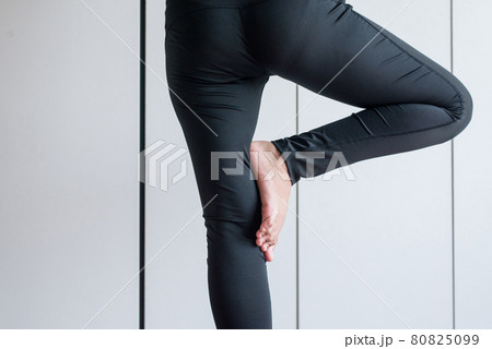 Close up of legs woman practicing doing yoga exercise workout after in gym,Healthy and lifestyle concept. 80825099