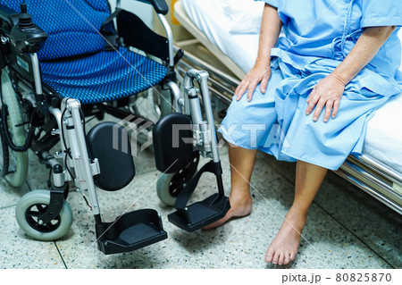 Asian senior or elderly old lady woman patient on electric wheelchair with remote control at nursing hospital ward : healthy strong medical concept . Asian senior or elderly old lady woman patient on electric wheelchair with remote control at nursing hospital ward : healthy strong medical concept . 80825870