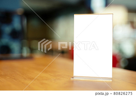 Mock up Menu frame standing on wood table in Bar restaurant cafe. space for text Mock up Menu frame standing on wood table in Bar restaurant cafe. space for text 80826275