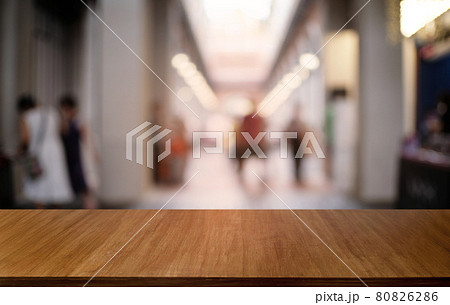 Empty dark wooden table in front of abstract blurred bokeh background of restaurant . can be used for display or montage your products.Mock up for space. 80826286