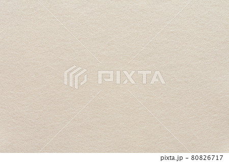 ベージュのフェルト生地のアップの写真素材