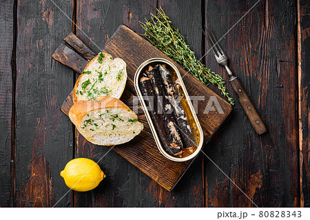Canned seafood preserved in oil, top view flat lay Canned seafood preserved in oil, top view flat lay 80828343