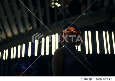 Cyberpunk style portrait of beautiful young woman in futuristic costume. Cyberpunk style portrait of beautiful young woman in futuristic costume. 80832431