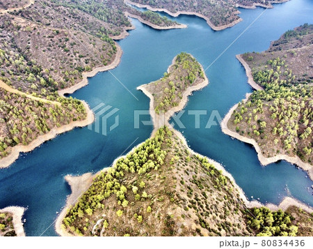 Aerial bird's eye drone view of water Lefkara reservoir river lake Cyprus Aerial bird's eye drone view of water Lefkara reservoir river lake Cyprus 80834436