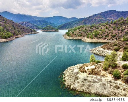 Aerial bird's eye drone view of water Lefkara reservoir river lake Cyprus Aerial bird's eye drone view of water Lefkara reservoir river lake Cyprus 80834438