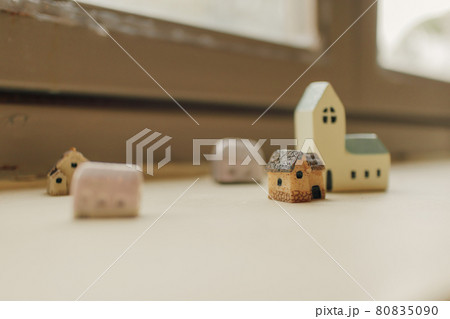 Tiny resin houses decorated on the edge of windows. Tiny resin houses decorated on the edge of windows. 80835090