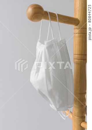 Medical white masks hanging 80844725