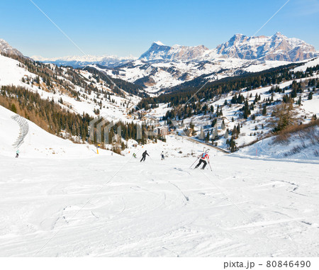 Skiers on a piste 80846490