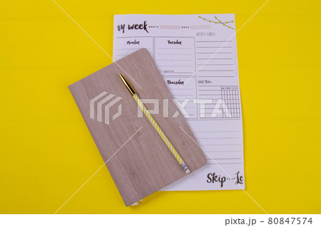 Top view book with pen and week calendar. Top view book with pen and week calendar. 80847574
