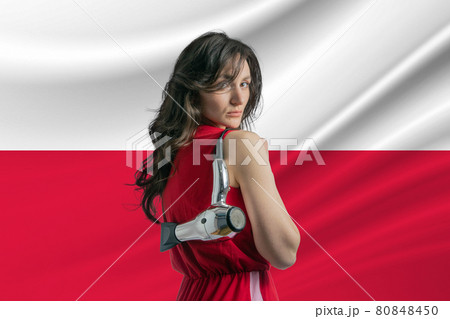 Beauty industry in Poland. Happy female hairdresser holding hairdryer against Poland flag background Beauty industry in Poland. Happy female hairdresser holding hairdryer against Poland flag background 80848450