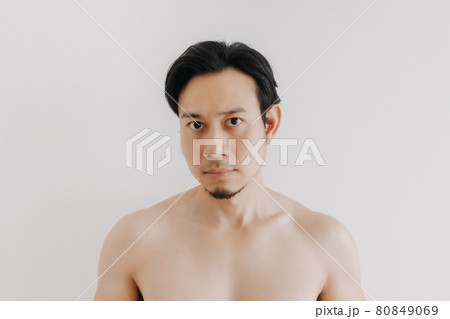 Shirtless man show off his face and skin for skincare product. Shirtless man show off his face and skin for skincare product. 80849069