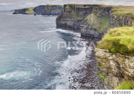 View over cliff line of the Cliffs of Moher in Ireland during daytime View over cliff line of the Cliffs of Moher in Ireland during daytime 80850890