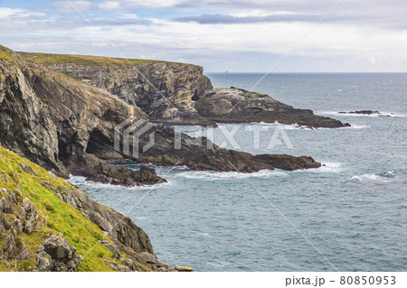 Rough cliff line at Mizen head lighthouse in southern west Ireland during daytime Rough cliff line at Mizen head lighthouse in southern west Ireland during daytime 80850953