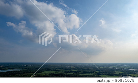 Aerial photo taken with a drone of a dark ominous grey storm clouds. Dramatic sky. lighting in dark Aerial photo taken with a drone of a dark ominous grey storm clouds. Dramatic sky. lighting in dark 80851079