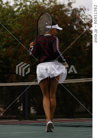 Sexy tennis player dancing on court Sexy tennis player dancing on court 80851562