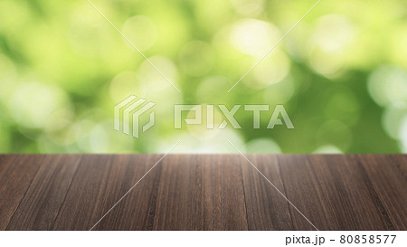 wood table top on green bokeh abstract background wood table top on green bokeh abstract background 80858577