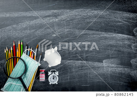 Top view of school supplies stationery and surgical face mask Top view of school supplies stationery and surgical face mask 80862145