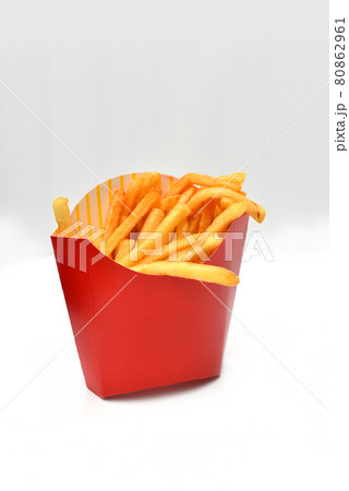 French fries in paper pack isolated on white French fries in paper pack isolated on white 80862961