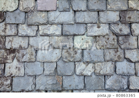 Aged slate tile roof background 80863365