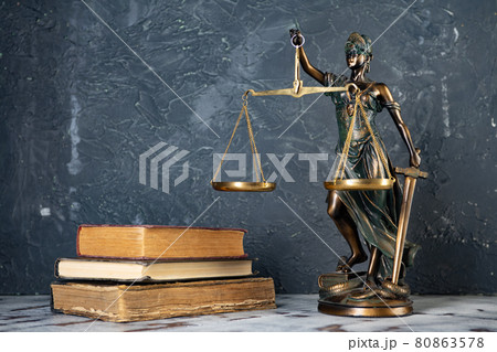 Scales of Justice, Lady Justice, law library concept, Law books in the background. 80863578