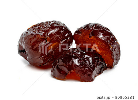 Chinese date or Jujube or monkey apple in syrup isolated on white background Chinese date or Jujube or monkey apple in syrup isolated on white background 80865231