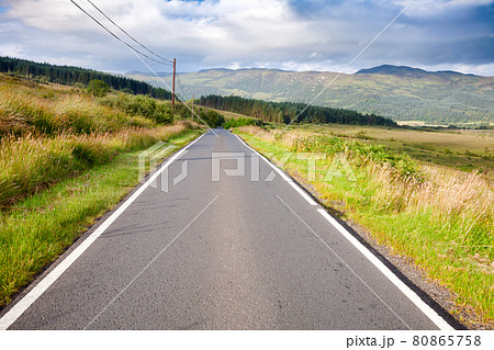 Scenic country road in Scottish Highlands Scenic country road in Scottish Highlands 80865758
