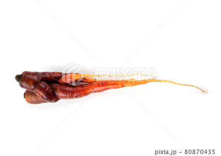 Funny ugly carrot isolated on white 80870435