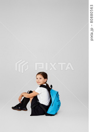 adorable schoolgirl with backpack. Back to school adorable schoolgirl with backpack. Back to school 80880563