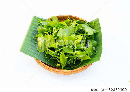 Melientha suavis pierre leaves on banana leaf in bamboo basket 80882409