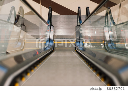 Shop escalator in shopping center, no people, isolation covid Shop escalator in shopping center, no people, isolation covid 80882701
