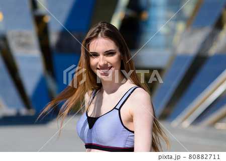 A close up of attractive young woman running A close up of attractive young woman running 80882711