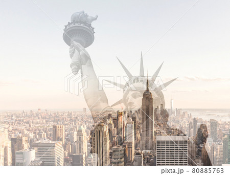 Double exposure of Manhattan skyline in new york city with statue of liberty silhouette 80885763