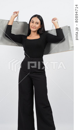 Love Shopping concept. Beautiful Asian woman carrying gray color bags shopping online. isolated on white studio background. online shopping bag. black hair woman love shopping online. Online purchase Love Shopping concept. Beautiful Asian woman carrying gray color bags shopping online. isolated on white studio background. online shopping bag. black hair woman love shopping online. Online purchase 80894714
