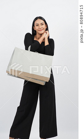 Love Shopping concept. Beautiful Asian woman carrying gray color bags shopping online. isolated on white studio background. online shopping bag. black hair woman love shopping online. Online purchase Love Shopping concept. Beautiful Asian woman carrying gray color bags shopping online. isolated on white studio background. online shopping bag. black hair woman love shopping online. Online purchase 80894715