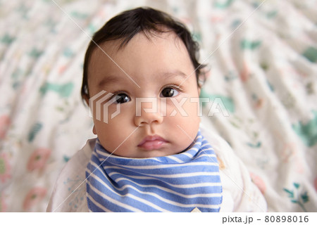 Close up face of little cute Asian baby, look at camera Close up face of little cute Asian baby, look at camera 80898016