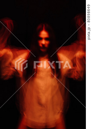 blurry portrait of a psychopathic girl with schizophrenic mental disorders 80898649