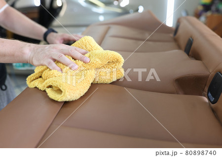 Car interior and leather seat cleaning closeup Car interior and leather seat cleaning closeup 80898740