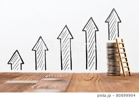 Business growth and income concept with drawn up arrows and coins with ladder Business growth and income concept with drawn up arrows and coins with ladder 80899904
