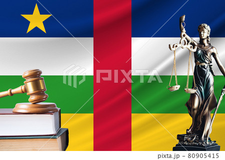 Law and justice in Central African Republic. Statue of themis and the gavel of the judge against the background of the flag of Central African Republic. Law and justice concept Law and justice in Central African Republic. Statue of themis and the gavel of the judge against the background of the flag of Central African Republic. Law and justice concept 80905415