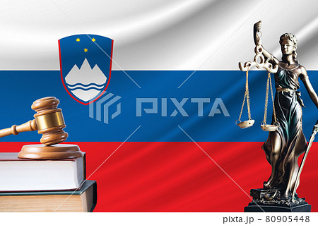 Law and justice in Slovenia. Statue of themis and the gavel of the judge against the background of the flag of Slovenia. Law and justice concept Law and justice in Slovenia. Statue of themis and the gavel of the judge against the background of the flag of Slovenia. Law and justice concept 80905448