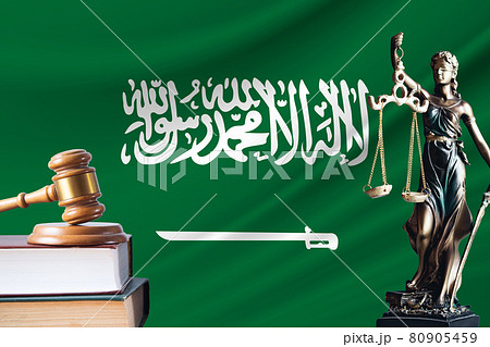 Law and justice in Saudi Arabia Statue of themis and the gavel of the judge against the background of the flag of Saudi Arabia Law and justice concept 80905459