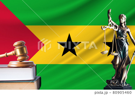 Law and justice in Sao Tome and Principe. Statue of themis and the gavel of the judge against the background of the flag of Sao Tome and Principe. Law and justice concept Law and justice in Sao Tome and Principe. Statue of themis and the gavel of the judge against the background of the flag of Sao Tome and Principe. Law and justice concept 80905460