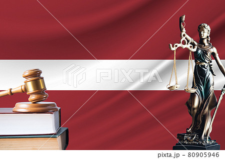 Law and justice in Latvia Statue of themis and the gavel of the judge against the background of the flag of Latvia Law and justice concept 80905946