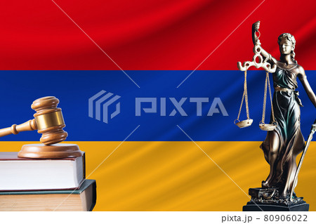Law and justice in Armenia. Statue of themis and the gavel of the judge against the background of the flag of Armenia. Law and justice concept Law and justice in Armenia. Statue of themis and the gavel of the judge against the background of the flag of Armenia. Law and justice concept 80906022