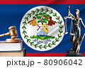 Law and justice in Belize. Statue of themis and the gavel of the judge against the background of the flag of Belize. Law and justice concept 80906042