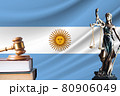 Law and justice in Argentina. Statue of themis and the gavel of the judge against the background of the flag of Argentina. Law and justice concept 80906049